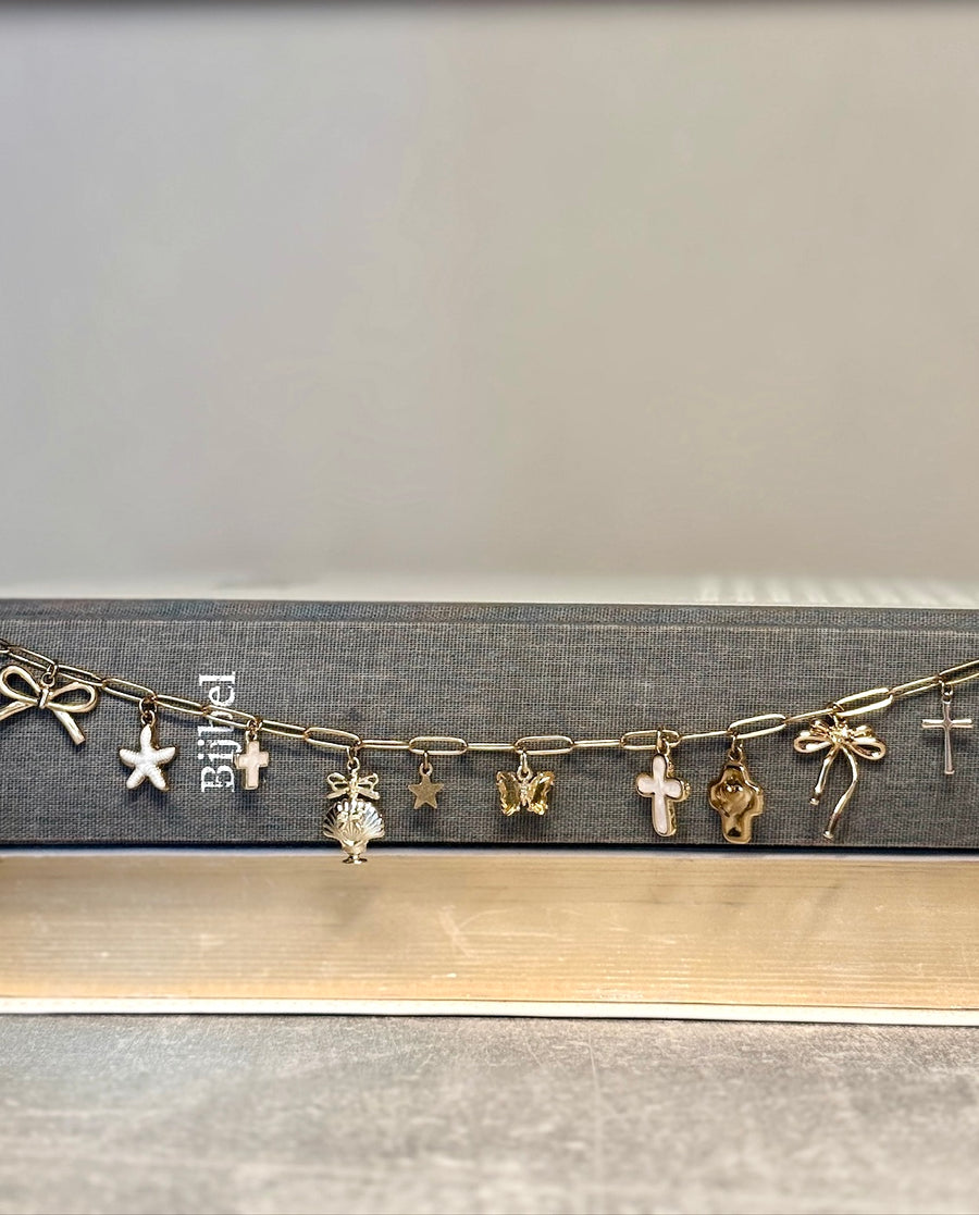 PEREGRINA — Gouden Bijbelketting met Schelp & Sterren