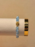 CAELUM — Kralenarmband Hemelsblauw met Kruis