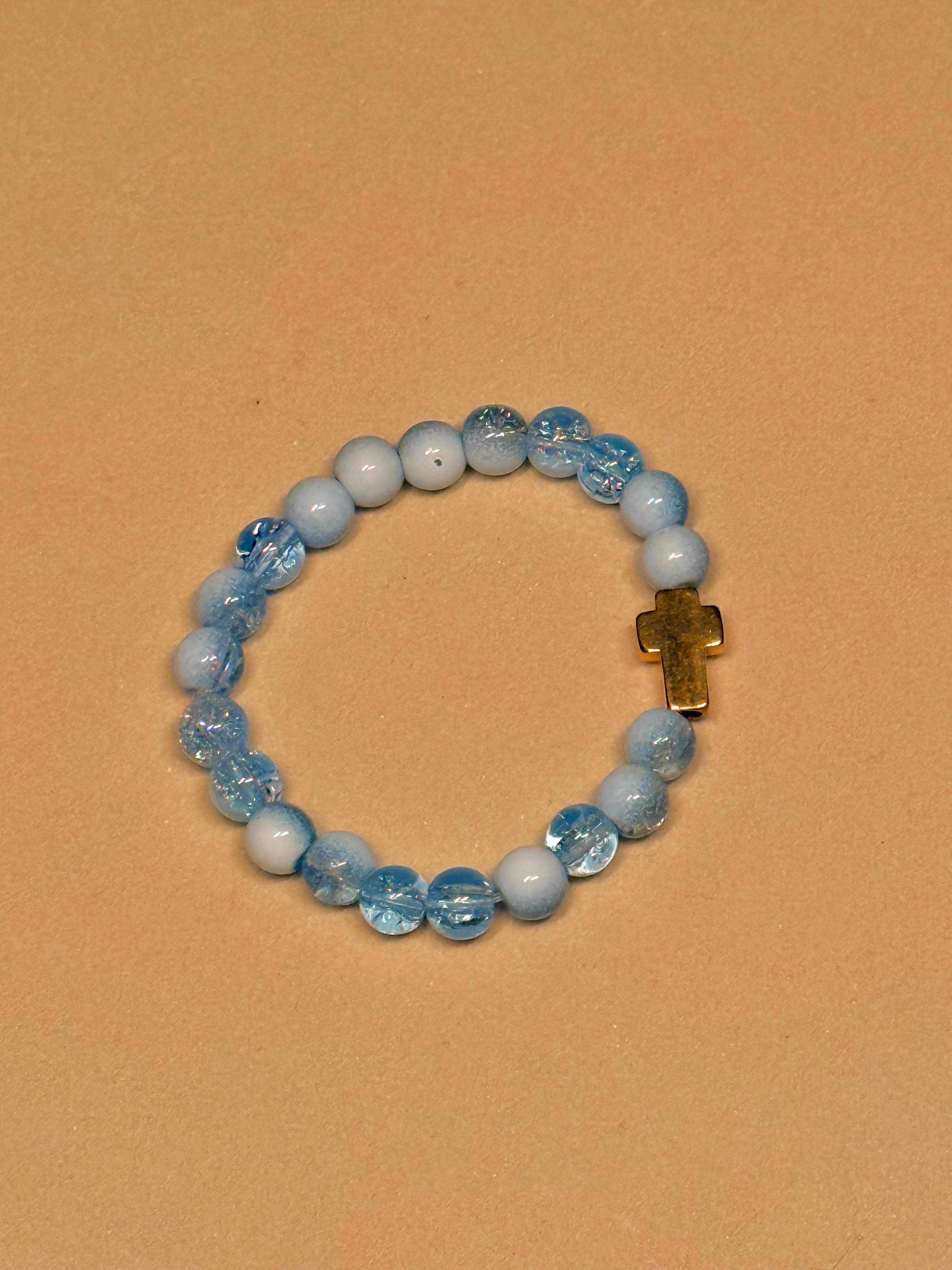 CAELUM — Kralenarmband Hemelsblauw met Kruis