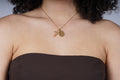 Gouden kruisketting met een Virgin Maria bedel