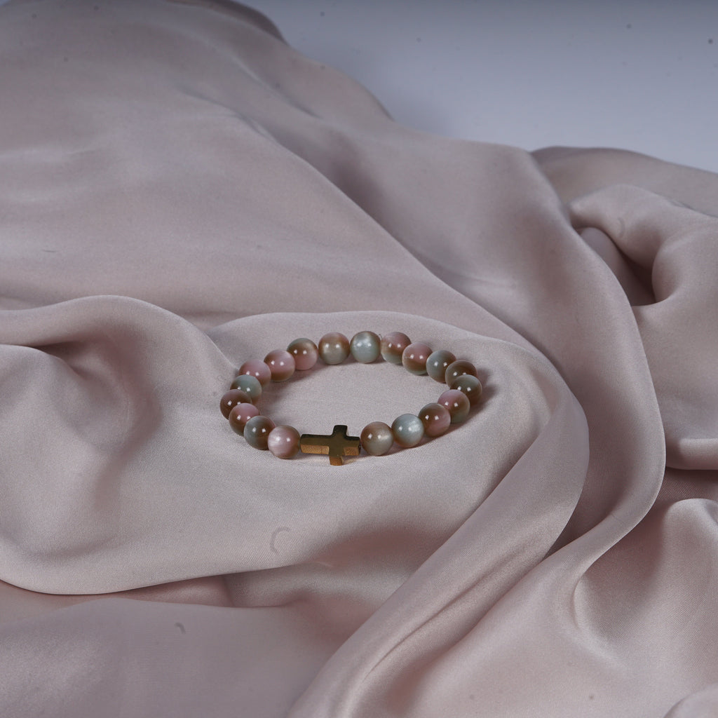 Multicolor bracelet with a cross charm
