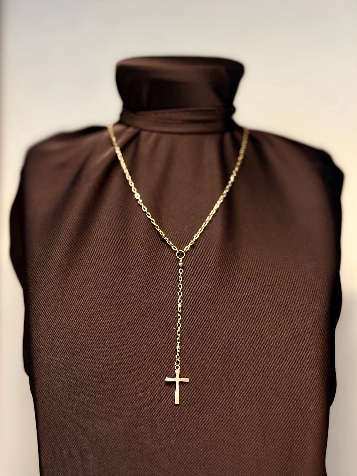 GRATIA — Gouden Kruis Lariat.